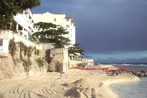 The sand is leveled to the height of the boardwalk