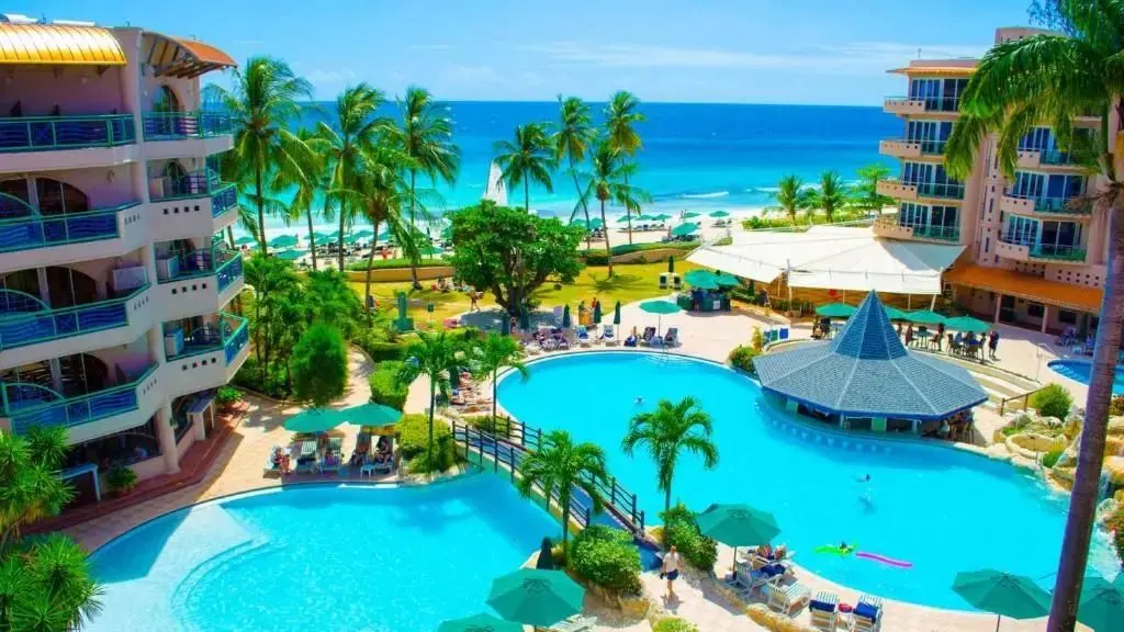 Looking across the pool and onto Accra Beach from a hotel balcony.