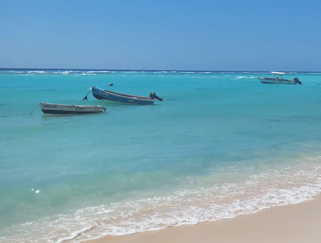 View from the boardwalk of the traditional Barbados fishing boats in the bay