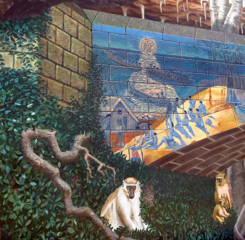 Close up view of a section of the Speightstown mural depicting the green monkey and Amerindian inhabitants.