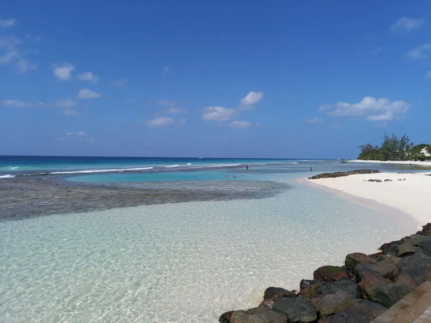 Shallow ocean pool with clear turquoise waters located at the end of the boardwalk